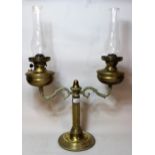 Late 19th / early 20th Century brass twin light oil lamp with glass chimneys, 68cms x 49cms