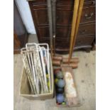 Early 20th Century croquet set, comprising of six balls, four mallets, hoops etc.