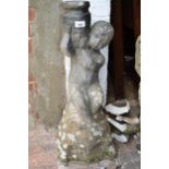 20th Century weathered cast concrete birdbath, the pedestal in the form of a seated cherub holding