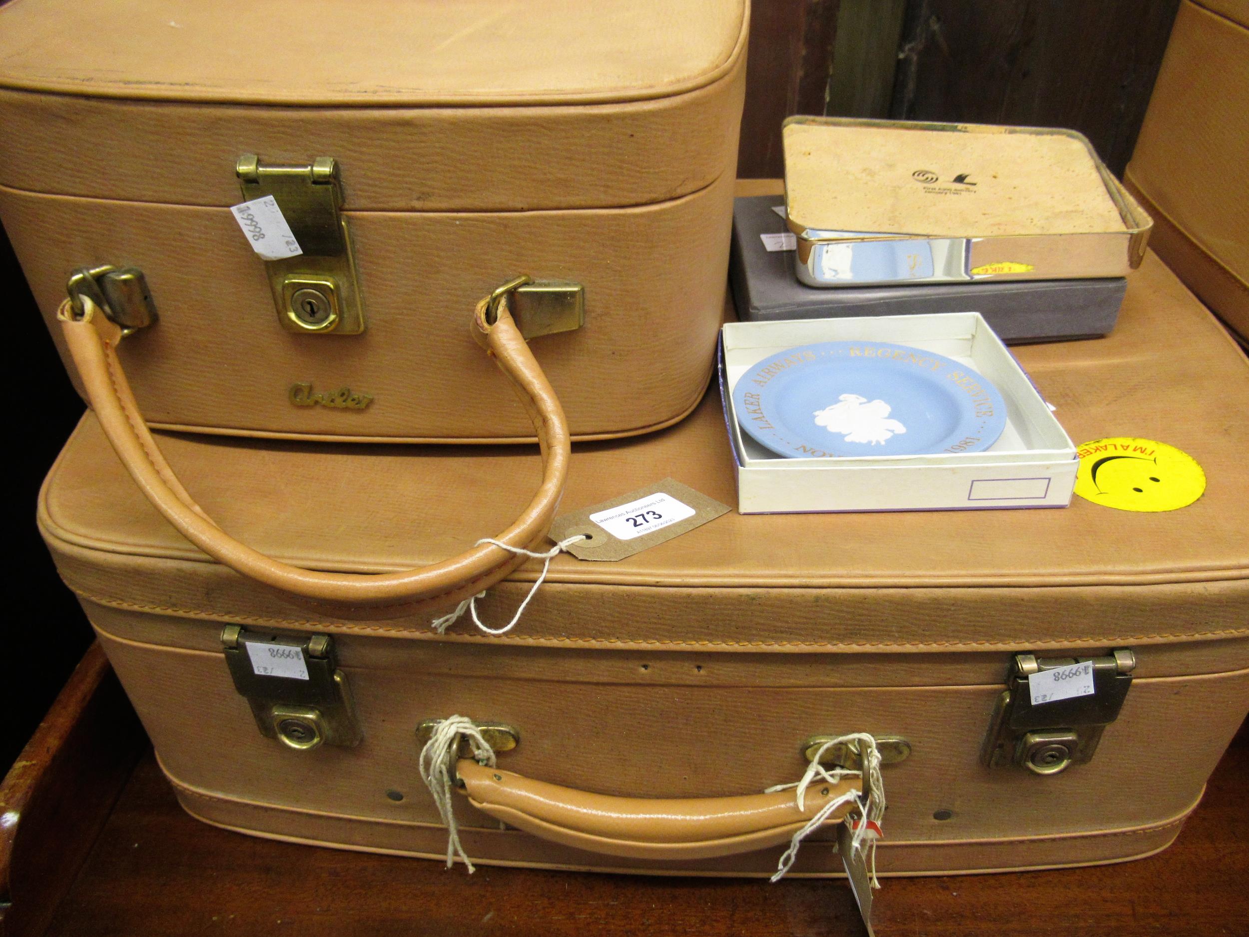 Set of four Antler suitcases by direct descent from Freddie Laker, together with a presentation box,