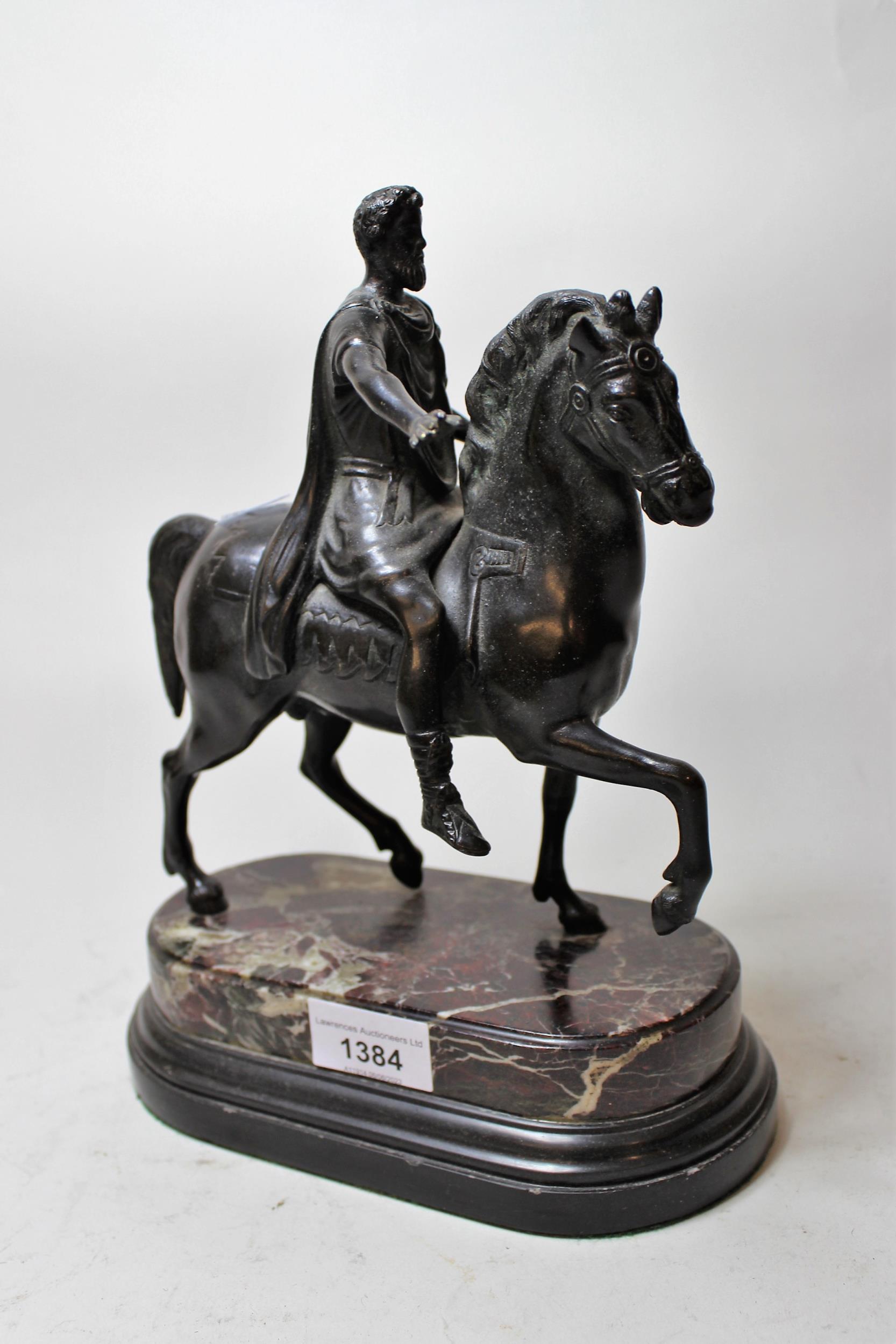 Reproduction dark patinated bronze figure of classical warrior on horseback, 27cms high