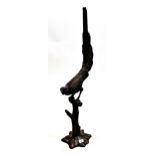Large bronze figure of a parrot on a stand, 90cms high