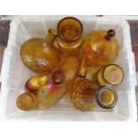 Group of eight various mid 20th Century amber glass items