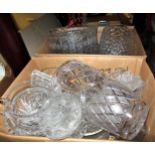 Two boxes containing a quantity of various cut glass fruit bowls, and vases