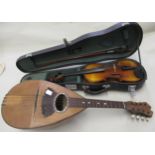Italian mandolin with tortoiseshell, mother of pearl and line inlaid decoration, together with a