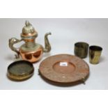 Circular embossed copper dish on low brass feet, Middle Eastern copper and plated water pot and