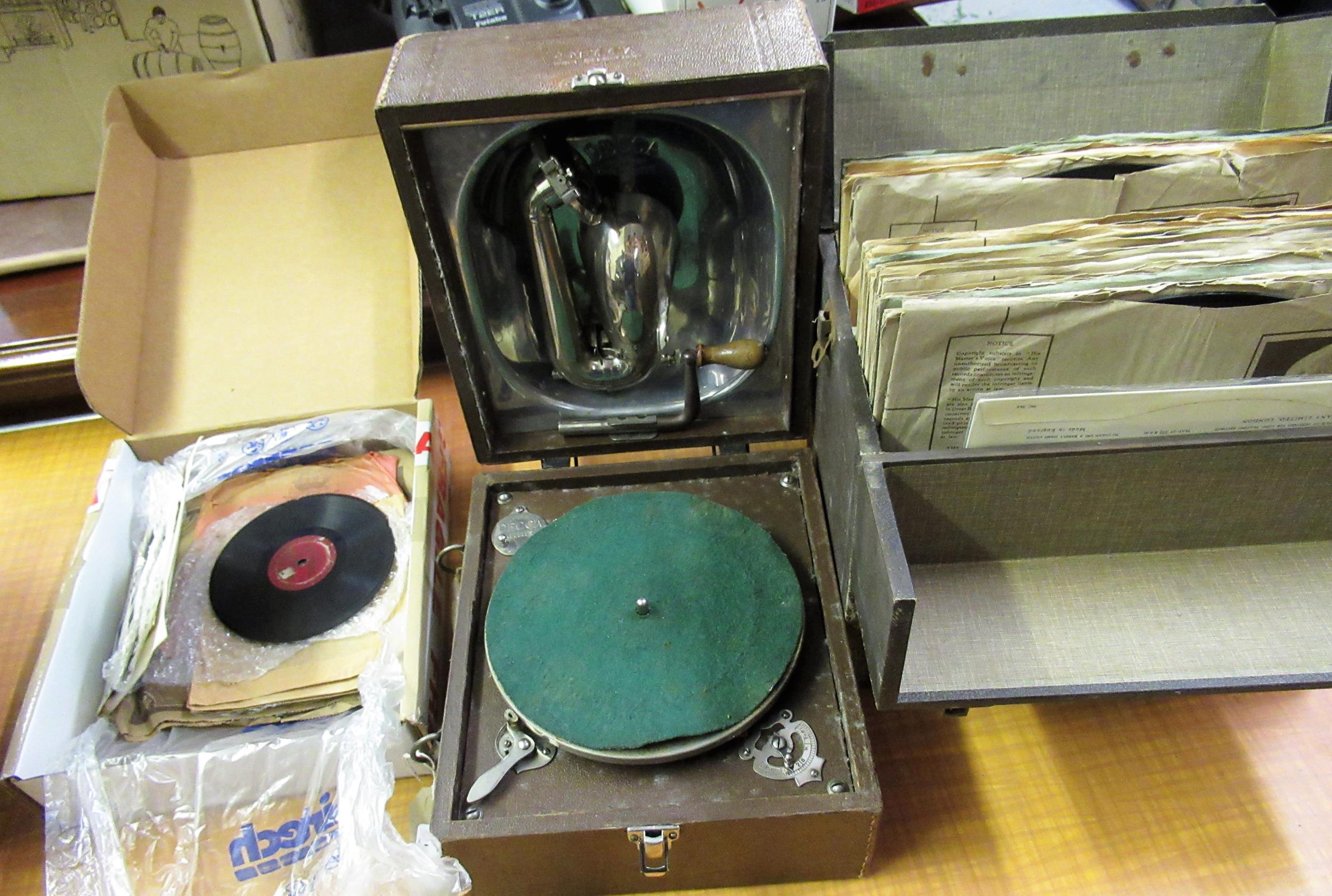 Decca ' Junior ' table model wind-up portable gramophone, together with a quantity of records