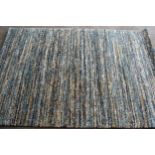 Modern deep pile rug of abstract design, 194cms x 133cms