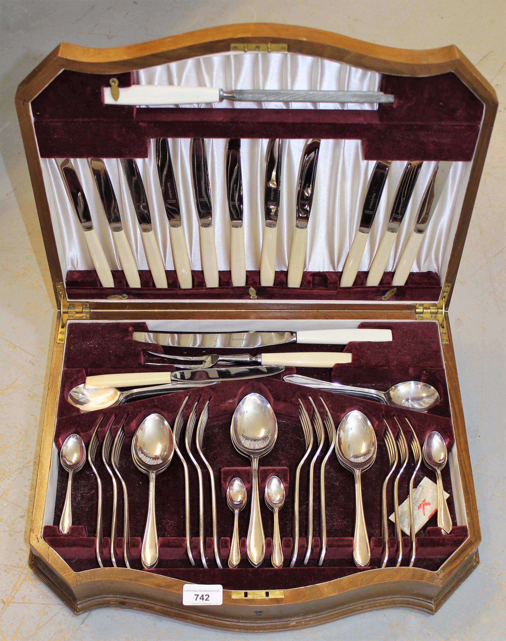 Walnut cased canteen of silver plated cutlery