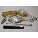 Seven various silver mounted dressing table items