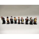 Collection of nine Royal Doulton, Dickensian figures including ' The Artful Dodger ', ' Fagin ' etc.