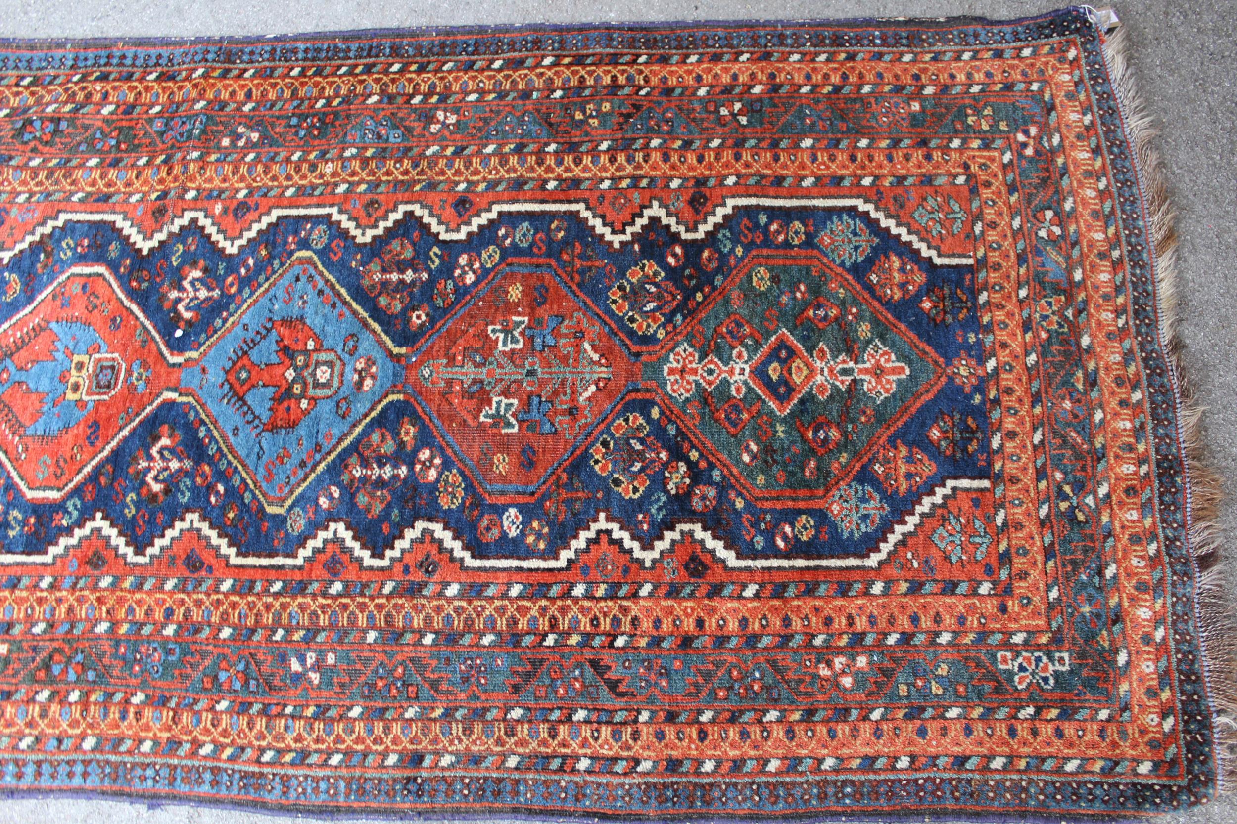 Afshar runner with a repeating polychrome pole medallion design on a midnight blue ground with - Image 4 of 5