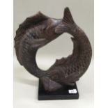 Austin Products Incorporated 1985, ceramic sculpture of fishes, signed Fisher, 45cms high x 37cms
