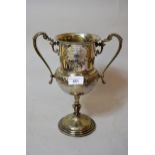 An impressive 19th Century two handled pedestal trophy cup presented by Thomas Hunter to The Carrick