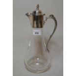 Modern silver mounted glass claret jug with star cut base, hinged lid and stylised handle, 29.5cms