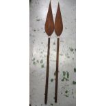 Pair of early to mid 20th Century Polynesian paddle clubs in carved hardwood, 178cms long