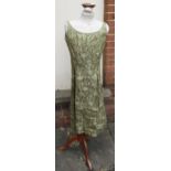 Bernard Freres, London and Paris, 1950's / 60's green and gold cocktail dress, size 14 and another