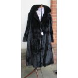 Ladies winter coat for Harrods, together with a black fur coat and other miscellaneous items of