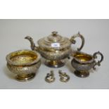 George IV Scottish silver three piece tea service of circular squat baluster form with embossed