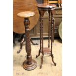 Reproduction mahogany torchere on barley twist supports, 101cms high together with a similar