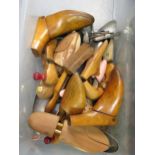 Box containing a quantity of vintage and 20th Century wooden shoe trees, including later aluminium