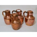 Group of four copper lidded jugs