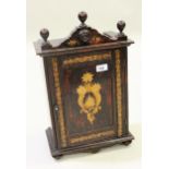 Early 20th Century stained wood smoker's cabinet with stencilled decoration, 50cms high