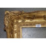 19th Century gilt picture frame, having broad section with scroll and leaf decoration, 34cm x 27cm