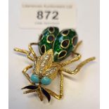 Modern 18ct yellow gold diamond set, and enamel decorated brooch, in the form of a beetle, (repair