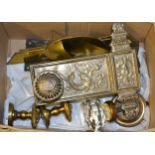 An ornate silvered brass door handle and lock plate, an Arts and Crafts metal and porcelain