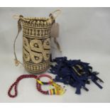 African bead and straw work basket, two beadwork items of jewellery and a collection of explorer