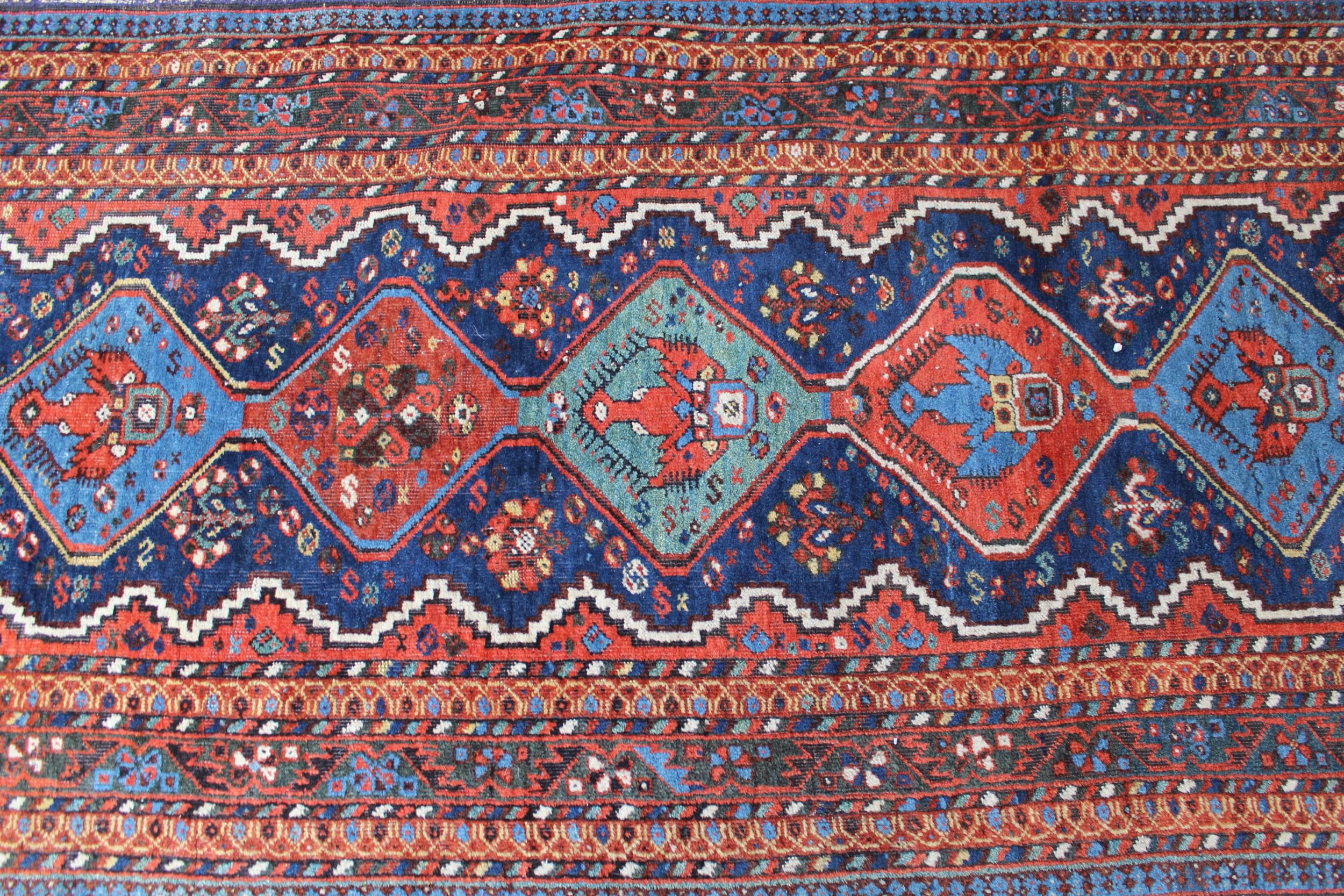 Afshar runner with a repeating polychrome pole medallion design on a midnight blue ground with - Image 3 of 5