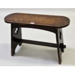 Small oak trestle ended bench with pierced ends and stretcher, 47cms high x 75cms wide x 26cms deep
