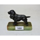 Austrian patinated spelter figure of a spaniel, on a simulated marble base
