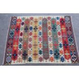 Large modern Kelim carpet with an all-over polychrome hooked medallion design, 325cms x 240cms