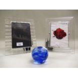 Orrefors Swedish glass photograph frame, a similar frame by Rosenthal and a Kosta Boda blue glass