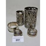 Two silver bottle stands, silver napkin ring and two small silver boxes, 3oz t