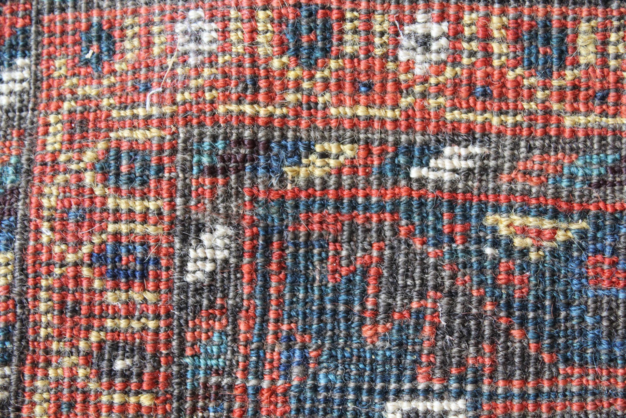 Afshar runner with a repeating polychrome pole medallion design on a midnight blue ground with - Image 5 of 5