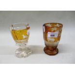 Bohemian amber overlaid clear glass goblet etched with stags and another (at fault)