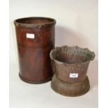 Arts & Crafts copper jardiniere and a leather wastepaper basket Dents to the jardiniere as per