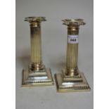 Pair of Sheffield silver fluted column candlesticks with square stepped bases, 18cms high