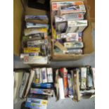 Four boxes containing a large quantity of model aircraft kits including Airfix, Revell etc.