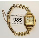 Ladies mid 20th Century 18ct yellow gold cased Rolex wristwatch with a gold plated bracelet, (non-