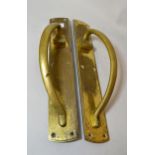 Pair of heavy early 20th Century brass door pulls with plates