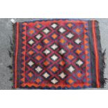 Two small Kelim mats, the largest 90cms x 71cms