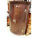 George III oak and mahogany crossbanded two door hanging corner cabinet (for restoration)