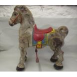 Mid 20th Century painted Mobo tin plate toy ride-on horse