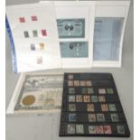 Folder containing stock book sheets of USA stamps, a share certificate and a quantity of revenue