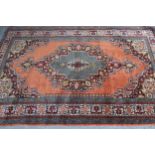 Indo Persian rug with a lobed medallion and plain design, with corner designs and borders, 195cms