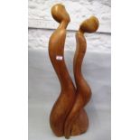 Modern wooden carved sculpture of two lovers embracing, 1m high